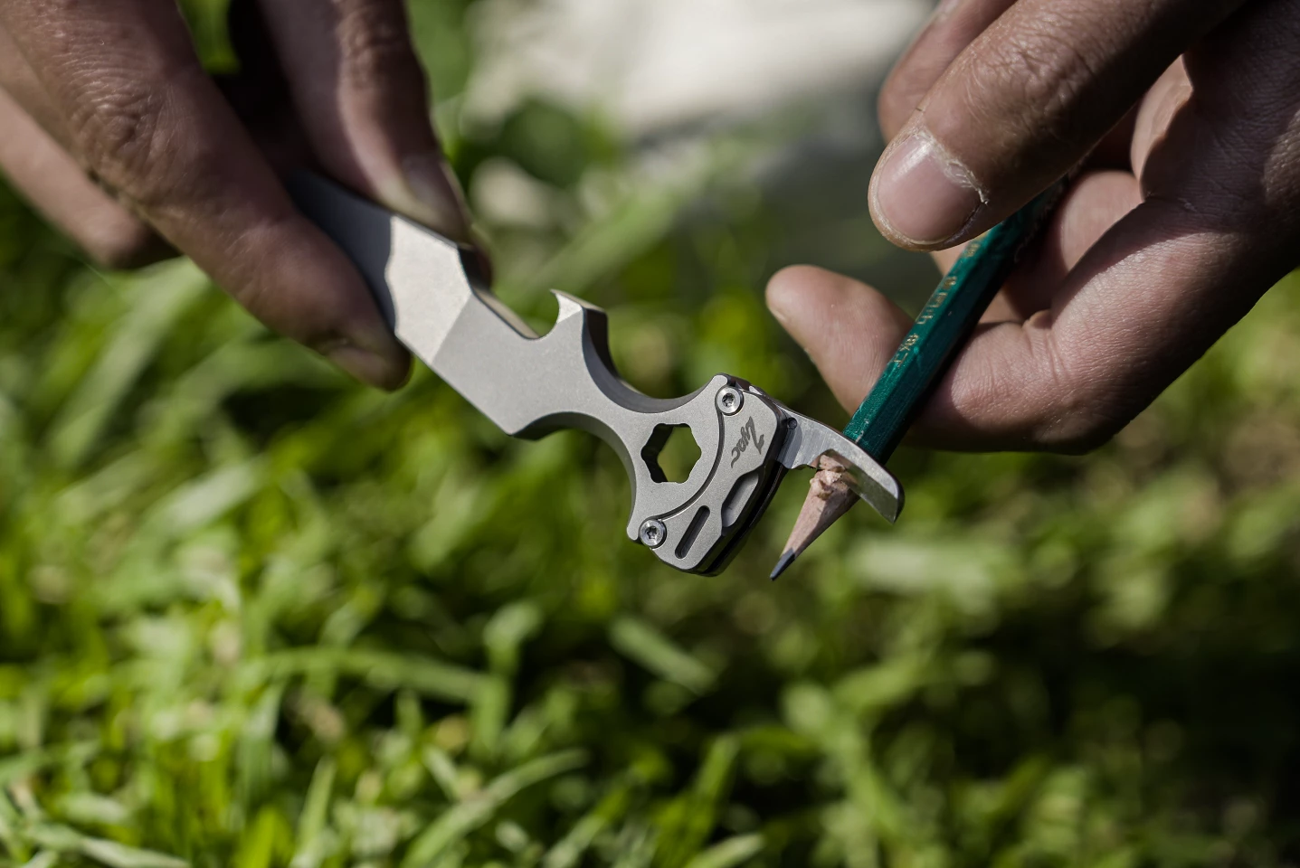 Titanium Xbar packs a blade, pry bar, bottle opener and hex